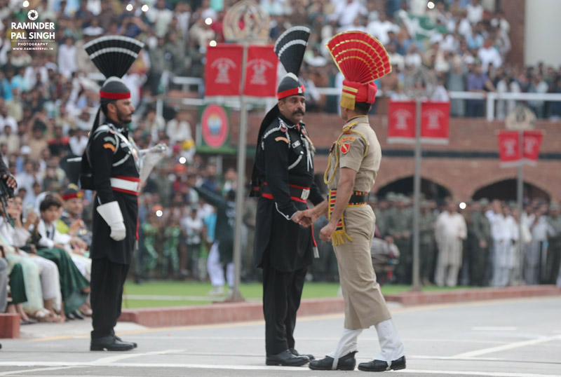 retreat ceremony at wagha/ attari border at indo pak border, soldiers staring at each other. 