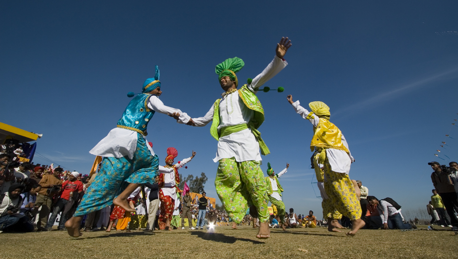 <img src="bhangra folk dance of punjab.jpeg" alt="best photo tour experience punjabi culture, festivals and folk art luxury nomadic unique experience of outdoor overlanding camp for best photography quiet secluded place very intimate experience">  