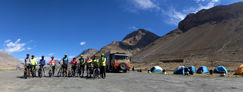 <img src="group cycling expedition with campervan ladakh.jpeg" alt="offbeat campervan camp and overland truck on the move in wilderness nomadic with all comforts of caravan camping best energy food manali to leh to kashmir srinagar ladakh">    