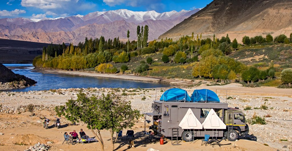 caravan camping in leh ladakh offbeat location for nomadic lifestyle in rural setting for unique experience vanlife best family holidays, vacation for couples. 