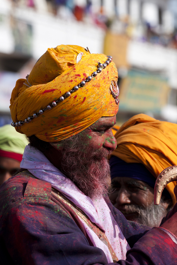 nihang sikhs playing holi with colours at anandpur sahab during hola mohalla in punjab. 